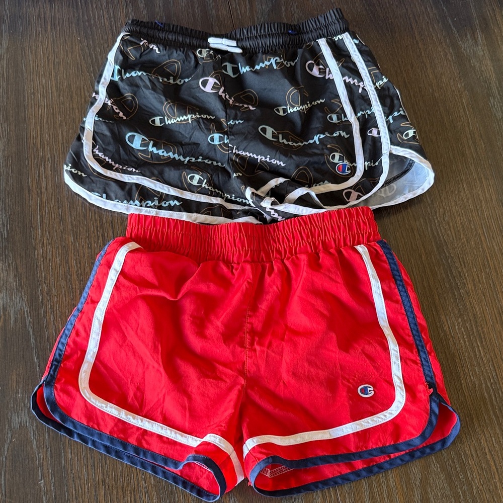 2 pairs of Champion shorts with built in underwear